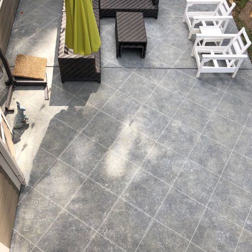 Weather-resistant concrete flooring for open areas